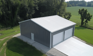 Aerial view of Ontario's steel garage kits showcasing multiple pre-fabricated metal buildings in a spacious outdoor setting.