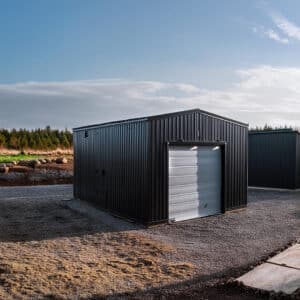 16x20 metal shed with a peaked roof and double doors, ideal for backyard storage and outdoor equipment organization